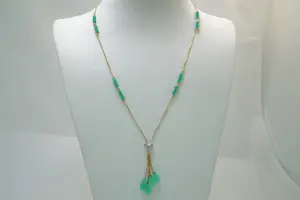 42 - 18 karaats bicolor gouden venetiaans collier met groene kralen en diamant kopen? Bied vanaf 420!