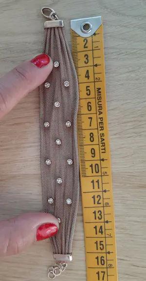 armband, op 'geweven schakeltjes’ bandje met 13 zirkonia steentjes in zetting kopen? Bied vanaf 60!