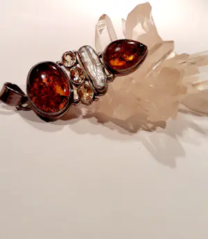 Grote zilveren Hanger met facet geslepen citrien en Amber en streepparel kopen? Bied vanaf 80!