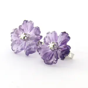 18k gouden oorknoppen met amethist en briljant geslepen diamant tot 0.05ct kopen? Bied vanaf 240!