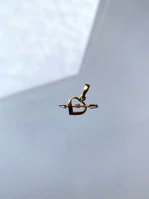 18kt gouden hanger, met simulant diamant.1,07 gr verkocht voor € 55!