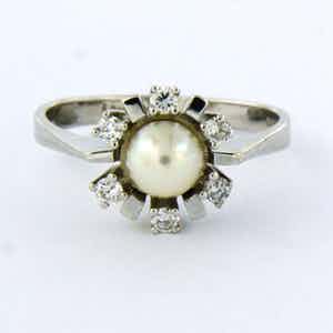 14k gouden ring bezet met parel en briljant geslepen diamant 0.15ct F/G - VS/SI verkocht voor € 240!