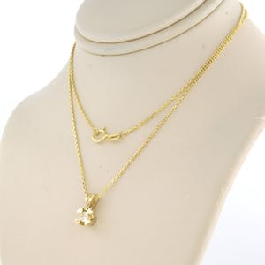 14k gouden collier met een solitair hanger bezet met Bolsjewiek geslepen diamant kopen? Bied vanaf 190!