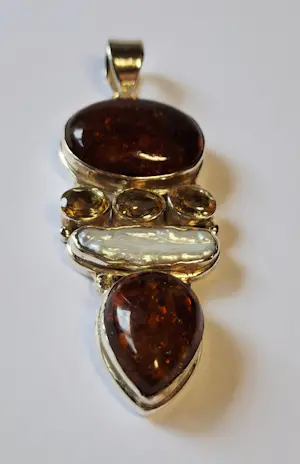 zilveren Hanger met facet geslepen citrien en Amber en oester streepparel kopen? Bied vanaf 70!