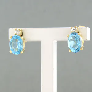 18k gouden oorknoppen bezet met topaas tot. 1,90ct en briljant geslepen diamant kopen? Bied vanaf 260!