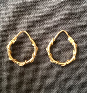 18K Goud - geelgouden getordeerde creolen kopen? Bied vanaf 1!