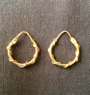 18K Goud - geelgouden getordeerde creolen verkocht voor € 1!