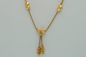 2524 - Stijlvol 18 karaats geel-gouden dames Dokiya "balletjes" halssieraad. kopen? Bied vanaf 220!