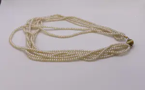 Vintage zes-strengs zoetwaterparel choker ketting met gouden sluiting kopen? Bied vanaf 300!