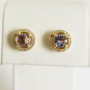 Oorbellen van tanzaniet met een diamanten halo. kaufen? Bieten Sie von 700!