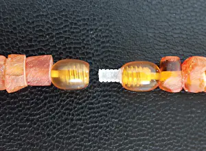 Baltisch barnsteen collier, natuurlijke honingkleur ruwe stenen, onbehandeld. kopen? Bied vanaf 75!