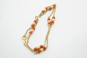 1865 - Sierlijk 18 Krt geel-gouden gourmette collier - met bloedkoraal kopen? Bied vanaf 250!