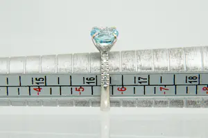 54 - Chique 18Kt witgouden & diamanten ring 0.15ct briljant en grote Aquamarijn kopen? Bied vanaf 280!