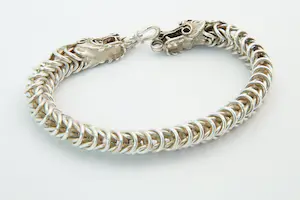 74 - Zware en aparte 2e gehalte zilveren dragon of draken armband kopen? Bied vanaf 90!