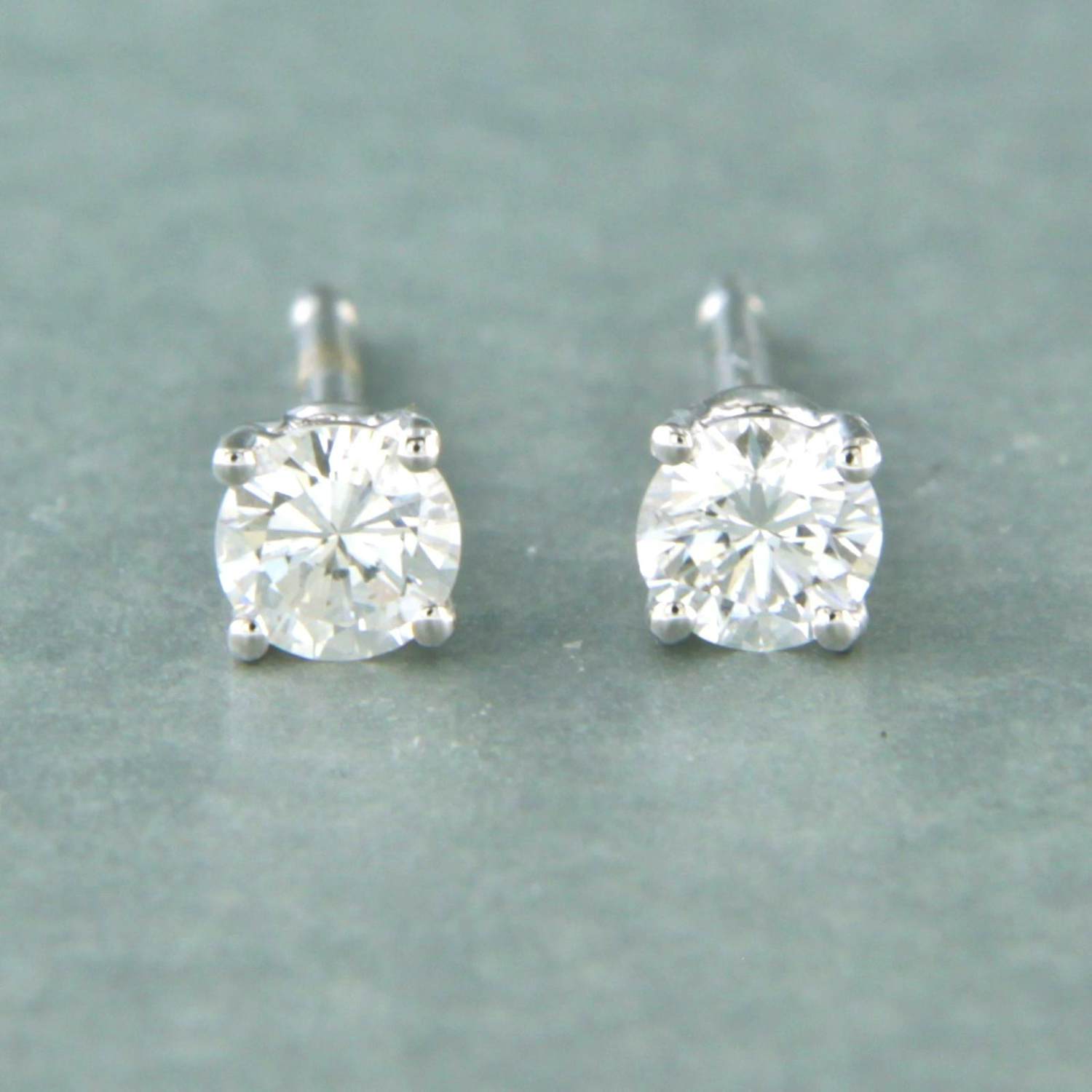 18k witgouden oorknoppen bezet met briljant geslepen diamant 0.20ct F/G VS/SI kopen? Bied vanaf 260!
