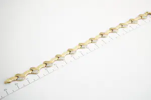 177 - Elegante 14krt gouden bi-color dames armband - gefaseerd afgewerkt kopen? Bied vanaf 165!