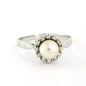 14k wit gouden ring bezet met parel en single cut geslepen diamanten tot. 0.05ct kopen? Bied vanaf 310!