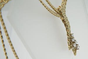 1921 -Vintage 14 kt goud & diamant (1.00ct) dubbele Scroll ketting - Strikmodel kopen? Bied vanaf 1340!