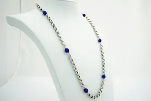 44 -  Lang (60cm) Surinaams 1e geh. Zilveren jasseron collier met  blauwe kralen kopen? Bied vanaf 25!