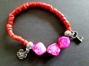 Koraal armband met Biwa parels verkocht voor € 1!