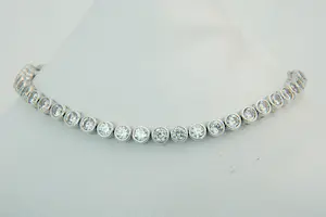 77 - Elegante 1e geh.  Zilveren armband "tennis" model - ca. 50 zirkonia's kopen? Bied vanaf 40!