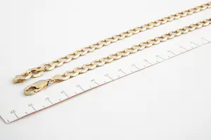 120- Lang & massief 9krt geelgouden gourmette collier met grote 9krt kruishanger kopen? Bied vanaf 720!