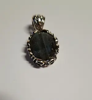 Nieuw zilveren hanger met facetgeslepen labradoriet kopen? Bied vanaf 60!