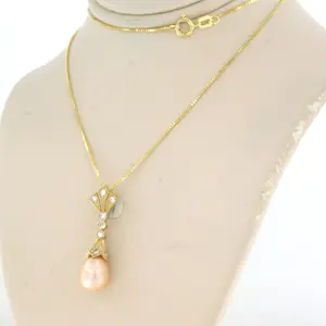 14k gouden collier en hanger met parel en single cut geslepen diamant tot.0.20ct kopen? Bied vanaf 280!