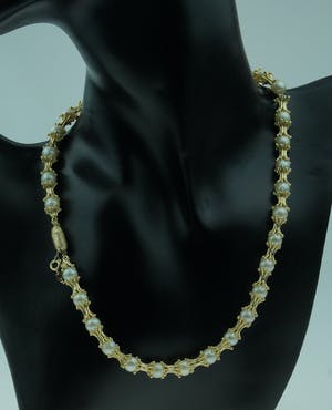 Exclusief 14 karaats gouden design collier met parels kopen? Bied vanaf 2199!