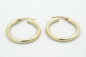 59 - Mooie paar holle 14 karaat geel gouden oorringen kopen? Bied vanaf 120!