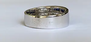 18 karaat witgouden band ring met 0,30 karaat diamanten en saffieren kopen? Bied vanaf 700!