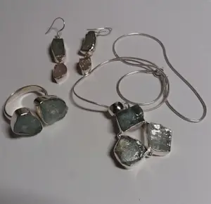 Set Zilveren sieraden  met Ruwe Aquamarijn . kopen? Bied vanaf 95!