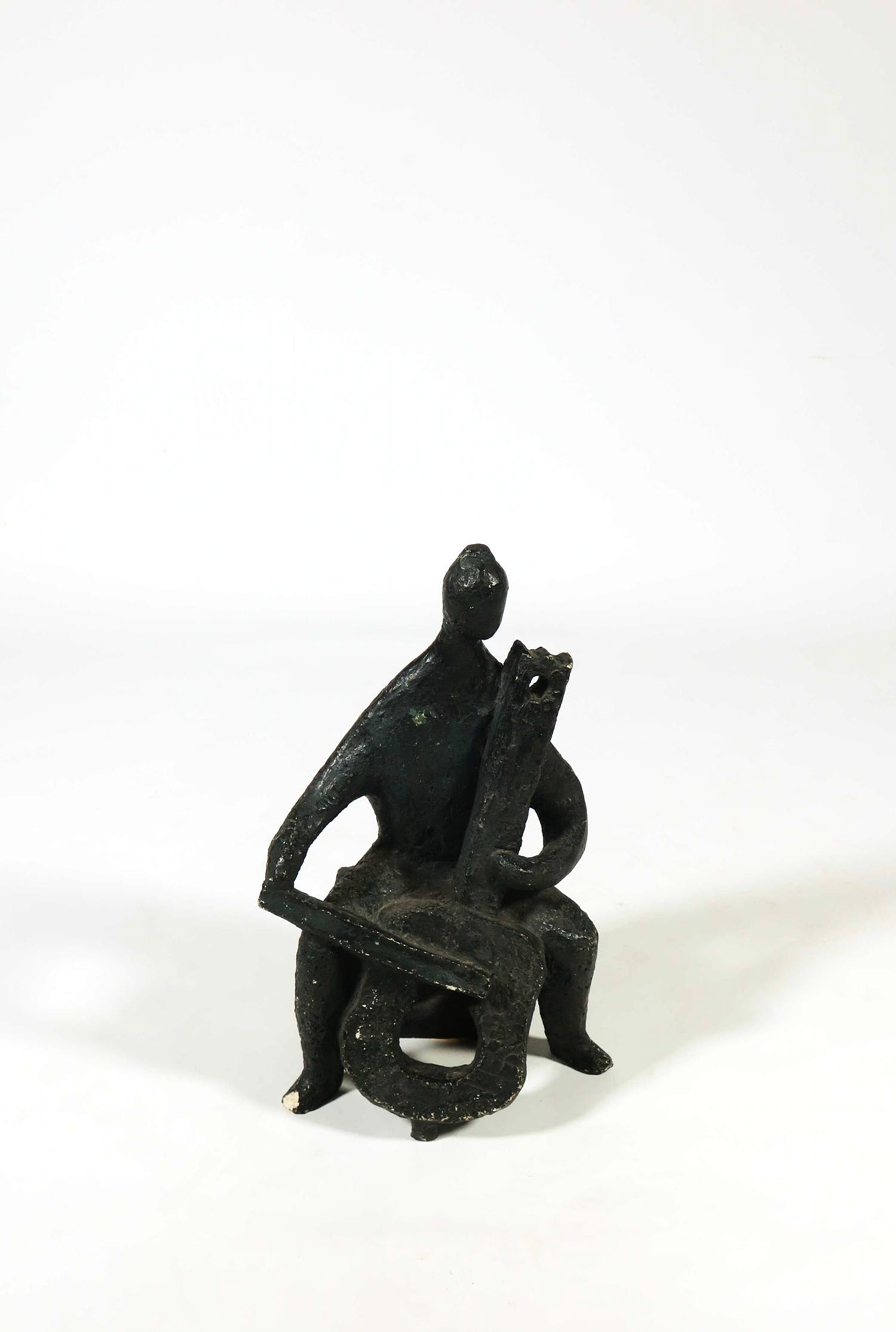 M.A.J. Neger - Gipsen beeld, Celliste kopen? Bied vanaf 1!