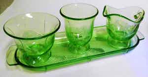 Niet of onleesbaar gesigneerd - Beautiful Art Deco four-piece cream set. verkocht voor € 10!