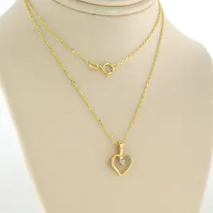 14k gouden collier met hanger bezet met briljant geslepen diamant kopen? Bied vanaf 110!