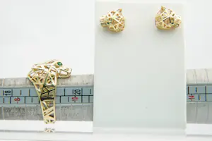80 - Aparte opengewerkte 18krt geelgouden SET van panter ring en oorstekers kopen? Bied vanaf 400!