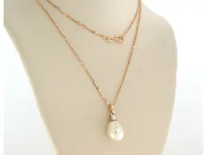 14k rosé gouden collier met hanger bezet met parel en briljant geslepen diamant kopen? Bied vanaf 170!