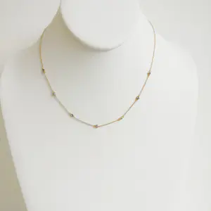 Geelgouden ketting met tanzaniet kopen? Bied vanaf 475!