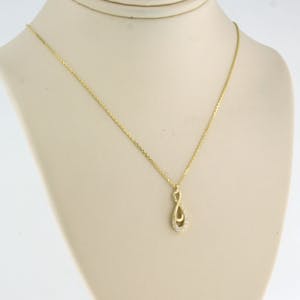 14k gouden collier met hanger bezet met briljant geslepen diamant tot 0.05ct kopen? Bied vanaf 1!