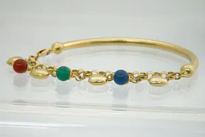 34 - Fraaie 18Krt  geel gouden armband met 7 hangertjes kopen? Bied vanaf 560!