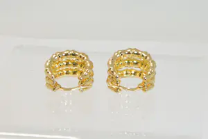 43 - 18 karaats paar geelgouden holle bamboe oorclips kopen? Bied vanaf 280!