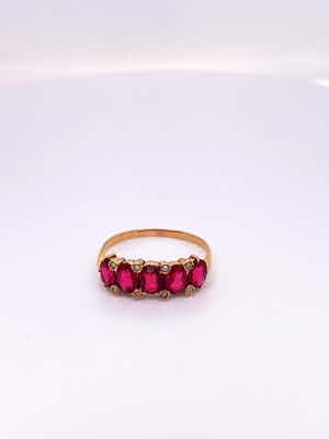 18kt gouden ring met parel en rode kleursteen, maat 55/17,5, 1,98gr verkocht voor € 250!