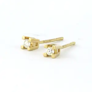 18k geel gouden solitair oorknoppen met briljant geslepen diamant tot. 0,18ct kopen? Bied vanaf 325!