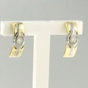 14k bicolour gouden oorknoppen bezet met briljant geslepen diamant tot. 0,06ct kopen? Bied vanaf 250!