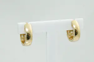 86- Bijzonder mooie & massieve set 18 krt goud & diamanten (ca.0.80ct) oorclips kopen? Bied vanaf 780!