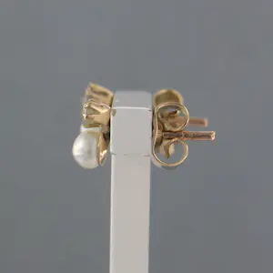 14k rosé gouden oorbellen met parel en diamant 0.10 ct kopen? Bied vanaf 115!