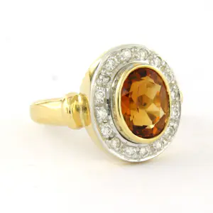 18k bicolour gouden ring met citrien en briljant geslepen diamant totaal 0.15ct kopen? Bied vanaf 710!