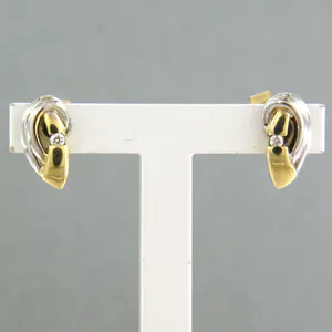 14k bicolour gouden oorknoppen bezet met briljant geslepen diamant tot 0,02ct kopen? Bied vanaf 1!