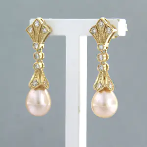 14k geel gouden oorhangers met parel en single cut geslepen diamant 0.34 ct kopen? Bied vanaf 375!