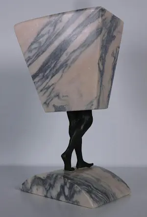 Hans Rikken - Set van twee sculpturen uit marmer en brons, Man + Vrouw + 2 boeken kopen? Bied vanaf 400!